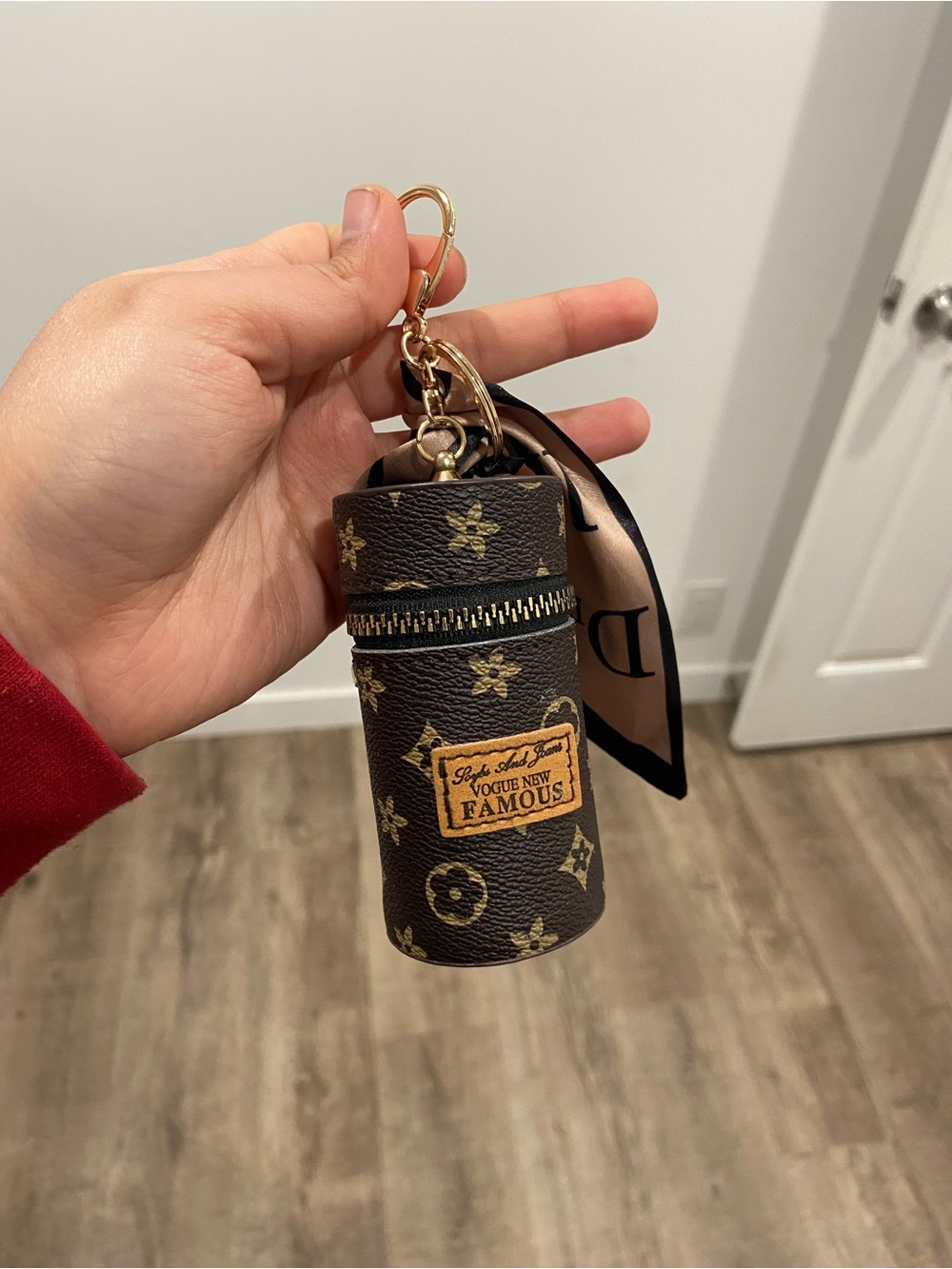 Monogram Cylinder Keychain Pouch in Brown & Gold
